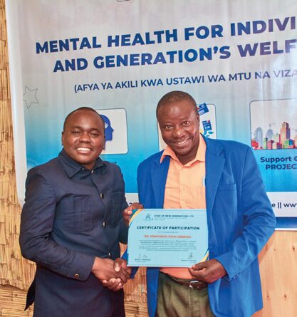 Participant receiving Certificate of Attendance