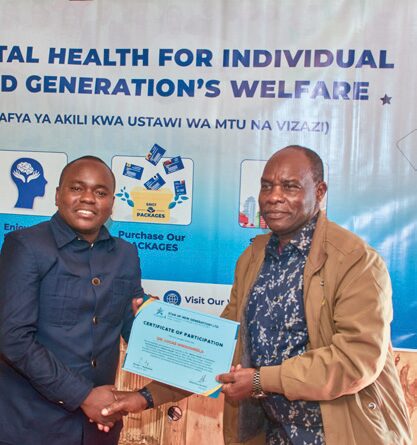 Participant receiving Certificate of Attendance