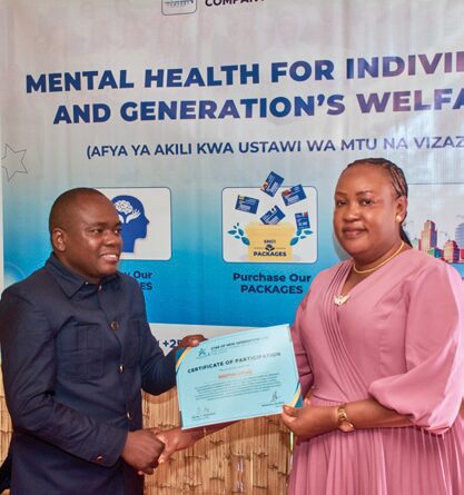 Participant receiving Certificate of Attendance