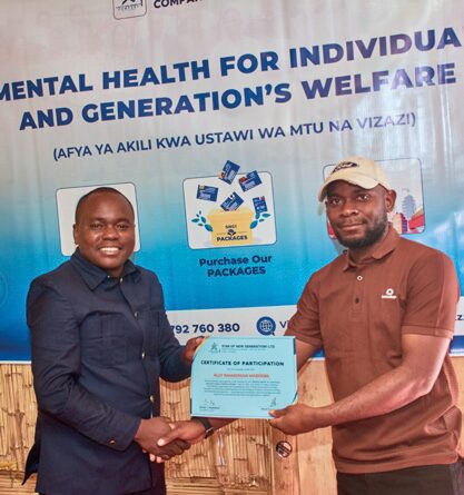 Participant receiving Certificate of Attendance