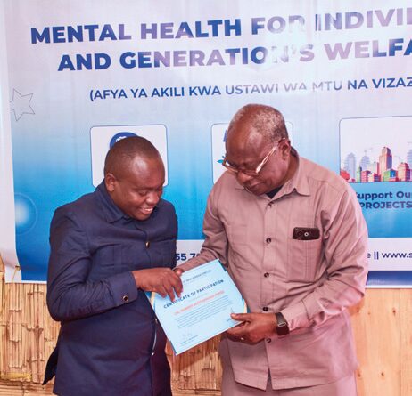 Participant receiving Certificate of Attendance