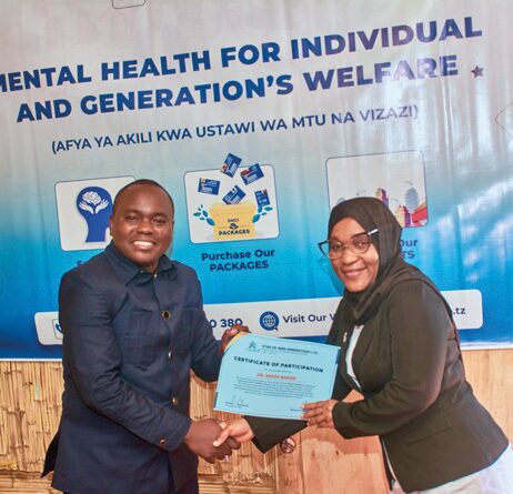 Participant receiving Certificate of Attendance