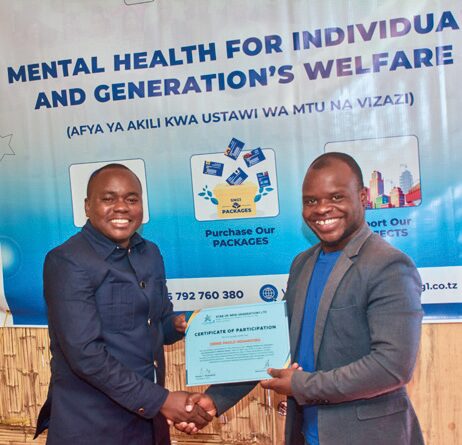 Participant receiving Certificate of Attendance