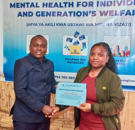 Participant receiving Certificate of Attendance