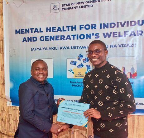 Participant receiving Certificate of Attendance