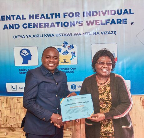Participant receiving Certificate of Attendance