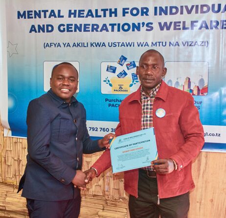 Participant receiving Certificate of Attendance