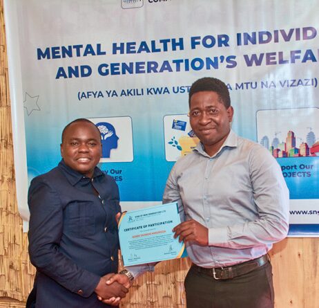 Participant receiving Certificate of Attendance