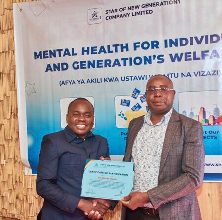 Participant receiving Certificate of Attendance