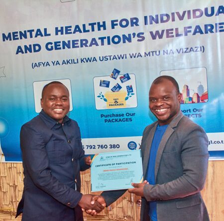 Participant receiving Certificate of Attendance