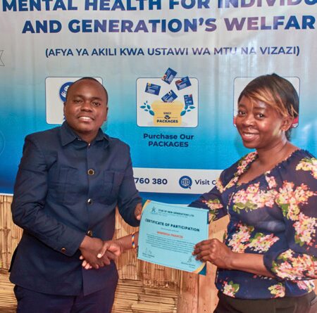 Participant receiving Certificate of Attendance